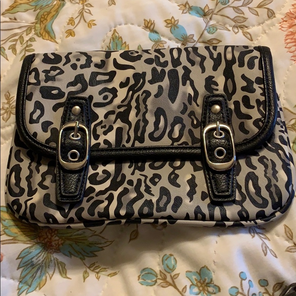 Grace Adele Leopard print clutch.